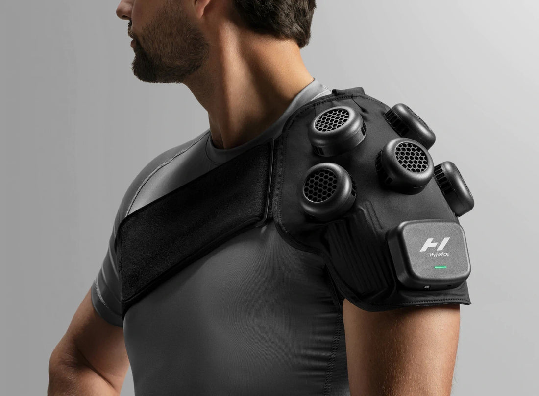 Hyperice X Shoulder therapy device in use, providing dynamic heating and cooling for muscle recovery.